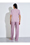 Pink Solid Pocket Detail T-Shirt and All Over Star Print Pants Pyjama Set - 5