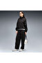 Her barrel leg trousers