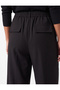 Comfortable Fit Pleated Pocketed Balloon Cut Fabric Trousers - 4
