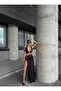 Women's Black Halter Neck Metal Ring Detailed Backless Crop Top and Side Slit Maxi Skirt Two-Piece Set - 2