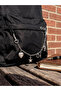 Women's backpack with chain accessory - 2