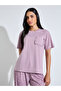 Pink Solid Pocket Detail T-Shirt and All Over Star Print Pants Pyjama Set - 2