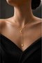 Women's Gold Color Moon and Star Necklace with Stone Dangle Design - 2