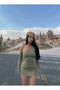 Green one-shoulder mini dress