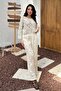 Ecru openwork knit blouse and pants set