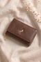 Brown Wallet with Logo Detail and Snap Fasteners