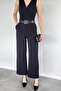 Black Women's V-Neck Jumpsuit with Gold Buckle Belt Accessory - 2