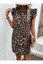 Women's short sleeve ruffle detail tie back leopard print jersey dress