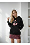 Women's three-thread soft touch long sleeve sweatshirt with pocket detail, drawstring tie, and embroidered bow accent.