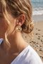 Gold Color Shell Earrings with Starfish and Purple Stone Detail - 2