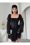 Women's Black Mini Dress with Corsage Detail, Chiffon Sleeves, Lace-Up and Flounces