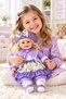 Cute Fashion Doll with Curly Hair & Floral Dress – Bonnet Hat, Soft Jacket, Layered Skirt & Matching Shoes – Available in Pink, Purple & Peach