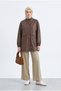 Trendy Oversized Faux Leather Jacket with Elastic Sleeves and Double Pockets