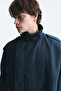 معطف كبير الحجم بأزرار وياقة عالية - 5