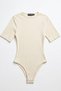 Beige Ribbed Stretchy Textured Crew Neck Short Sleeve Slim Fit Bodysuit with Snap Buttons at the Bottom