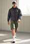 Men's Water-Resistant Raincoat & Windbreaker with Zipper Pockets in Dark Gray - 2