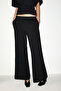 Argie Women's Asymmetrical Cut Top and Wide-Leg Pants Black Top and Bottom Set - 6