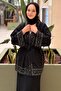 Knitwear Cardigan with Staple Detail on the Front, Sleeve Ends, and Back