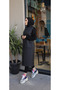 Long Quilted Black Women's Vest with Front Zipper Pockets and Lining