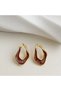 Small earrings with abstract drop-shaped design