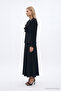 Elegant Black Suit with Ruffle Collar and Brooch Detail 1800 - 2