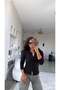 Black Buttoned Long Sleeve Ribbed Blouse