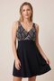 Women's Black and White Patterned One-Piece Swimsuit with Top Detail and Skirt