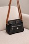 Women's Multi-Compartment Black-Tan Faux Leather Bag with Frame Detail and Shoulder and Crossbody Straps