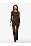 High-Waisted Spanish-Style Flared Pants with Belt Detail and Pockets