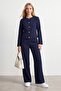 Buttoned suit with belt