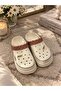 Woman's beige slipper