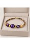 Stylish Bohemian Women's Bracelet with Purple Beads and Wooden Details and Gold Color Spacers - 3