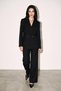 Black Double-Breasted Jacket with Button and Pocket Detailing, and Comfortable Cut Pants Set with Waist Detail