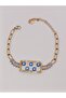 Gold Steel Bracelet with Evil Eye Beads and Bagette Stones - 2
