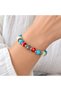 Turquoise Red White Beaded Elastic Bracelet – Stylish Accessory with Ethnic Detail