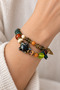 Green Orange Beaded Ethnic Bracelet with Large Figure Detail Authentic Accessory