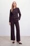Buttoned suit with belt
