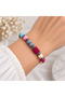 Colorful Beaded Elastic Women's Bracelet – Stylish Accessory with Fuchsia Black and Ecru Details