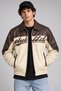 Men's Oversized Faux Leather Bomber Jacket with Fur Inside, Dual Color, Text Detailing, and Cream Color.