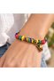 Colorful Beaded Multi-Row Bracelet with Gold Detailing, Ethnic Patterned, Stylish Women's Accessory