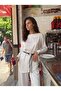 White Flowy Satin Crew Neck Blouse with Long Cuffed Sleeves and Oversized Waist Belt Detail
