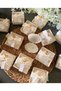 25 Candle Gifts with Ribbons in the Middle