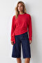 Women's red crew neck asymmetrical blouse with draped waist alc-x15865