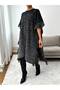 Self-Patterned Oversized Poncho with Tassel Detail