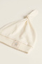 100% Cotton Interlock Travel by Sea Sailing Ship Embroidered Top-Tie Knotted Baby Beanie Hat 0-6 Months - 2