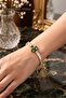 Emerald Green Floral Motif Thick Steel Bracelet with Gold Color Chain - 2