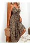 Women's leopard print long sleeve dress with tie straps, crew neck, and elastic waist.