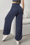Women's high-waisted, wide-leg viscose pants with drawstring waist and pockets. - 2