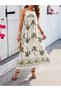 Women's floral print long sleeve supreme dress with spaghetti straps and a straight neckline.