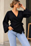 Crossover cut, black blouse with tie detail
